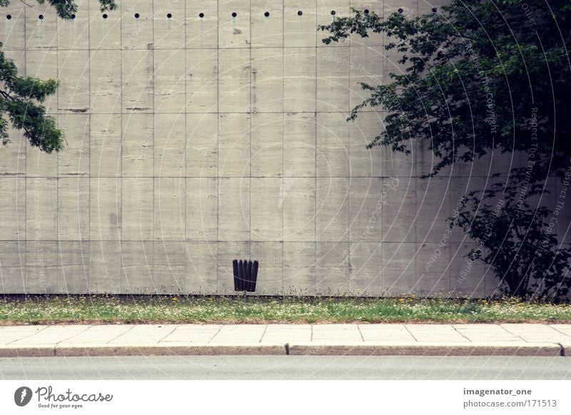 silence Subdued colour Exterior shot Deserted Day Long shot Small Town Manmade structures Wall (barrier) Wall (building) Stone Cold Boredom Moody