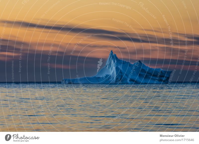 iceberg Ice Frost Ocean twillingate Newfoundland Canada Maritime Blue Yellow Orange Iceberg Sunset Twilight Landscape Nature Travel photography Colour photo