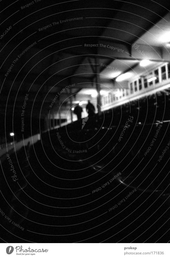 game over Black & white photo Exterior shot Night Artificial light Wide angle Human being Androgynous Friendship Going Row of seats Stadium Racecourse Stands