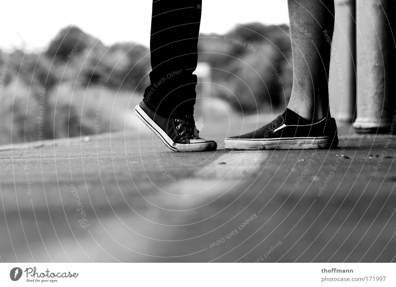 parted Black & white photo Exterior shot Detail Copy Space bottom Day Shadow Contrast Shallow depth of field Worm's-eye view Lifestyle Human being Masculine