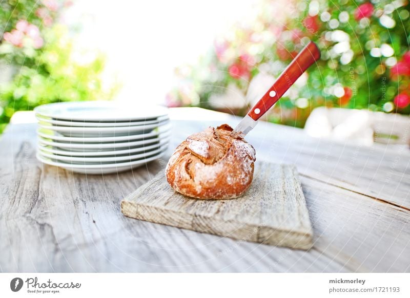 Fresh bread in the summer garden Bread Roll Nutrition Lunch Organic produce Slow food Crockery Plate Knives Lifestyle Style Contentment Feasts & Celebrations