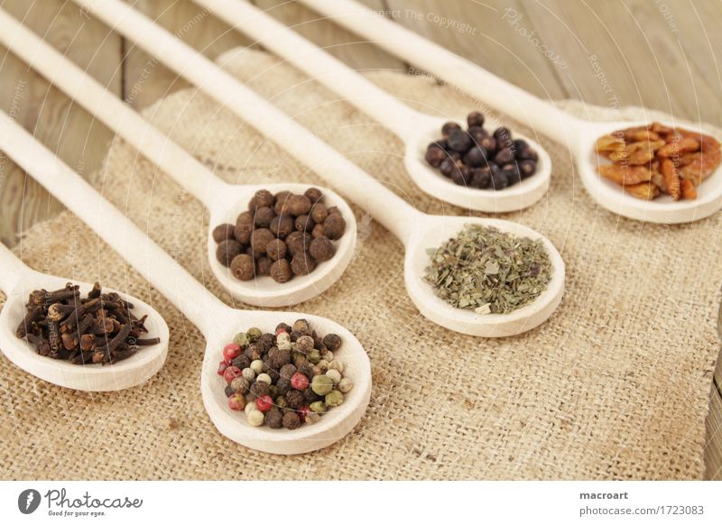 spices Herbs and spices Wooden spoon Linen Clove Pimento Juniper juniper berries Ingredients Spicy season Pepper Peppercorn Multicoloured Marjoram Basil Powder