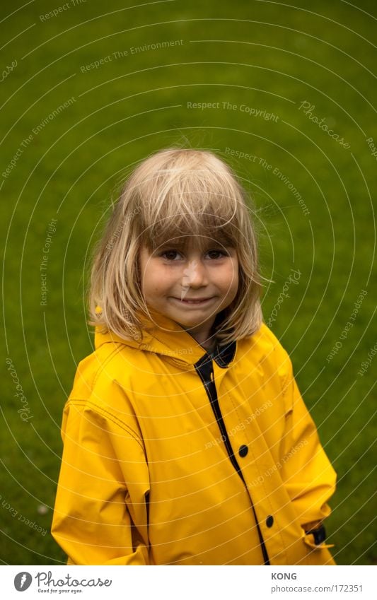 yellow green grins Colour photo Exterior shot Copy Space top Shallow depth of field Upper body Looking Looking into the camera Child Toddler Boy (child) 1