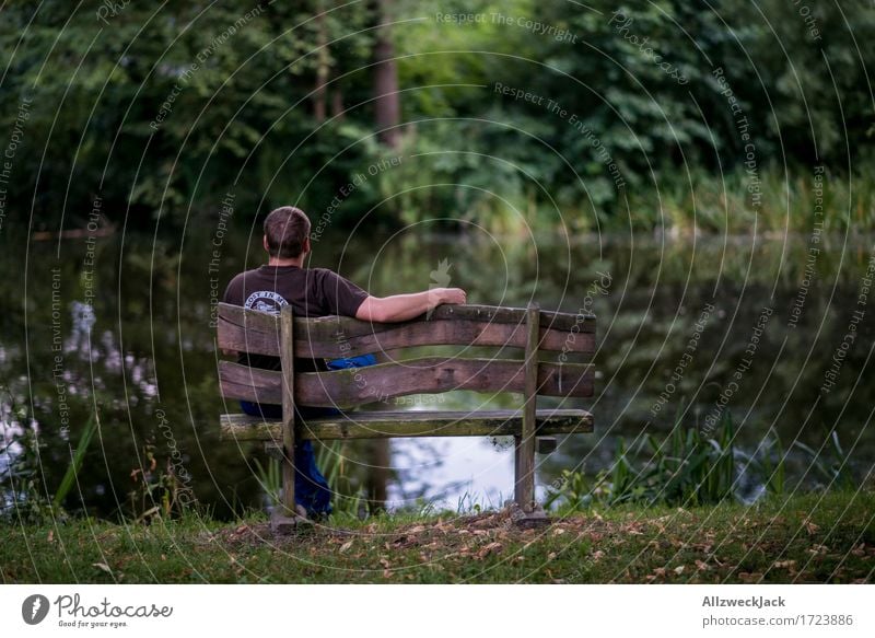 Break at the village pond 2 Masculine Young man Youth (Young adults) 1 Human being 18 - 30 years Adults Nature Park Pond Green Contentment Concentrate Calm