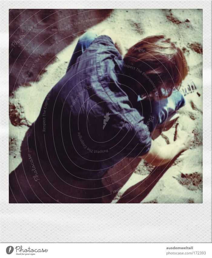 sandman Man Masculine Hair and hairstyles Long Brown Brunette Shirt Blue Jeans Sand Sit Beige Shadow Light Bright Summer Arm Hand Back Downward Polaroid