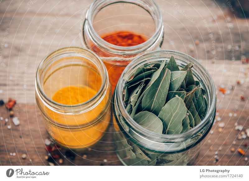 Spices in jars Herbs and spices Kitchen Leaf Wood Delicious Natural Green Red angle bay leaves colorful cooking Culinary Dried essentials flavor food healthy