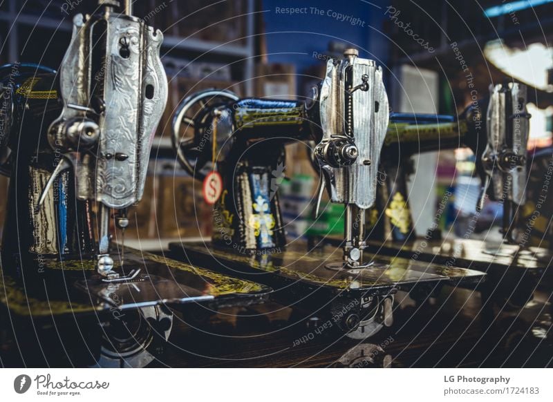 Vintage Sewing Machines Metal Old Services vintage Spool Fashion Industry Fabric thread Tailor Tool Colour photo Close-up Detail Deserted Blur