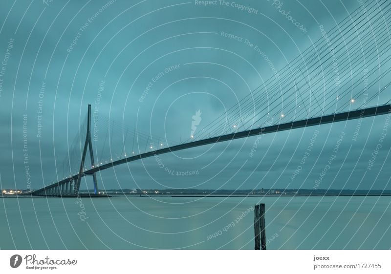 remote connection Sky Clouds Bridge Traffic infrastructure Gigantic Large Blue Black Pont de Normandie Colour photo Subdued colour Exterior shot Deserted