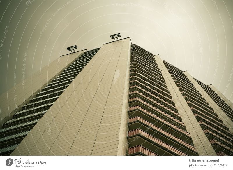 winter garden Subdued colour House (Residential Structure) High-rise Facade Balcony Threat Dark Large Tall Gloomy Gray Advancement Town Prefab construction