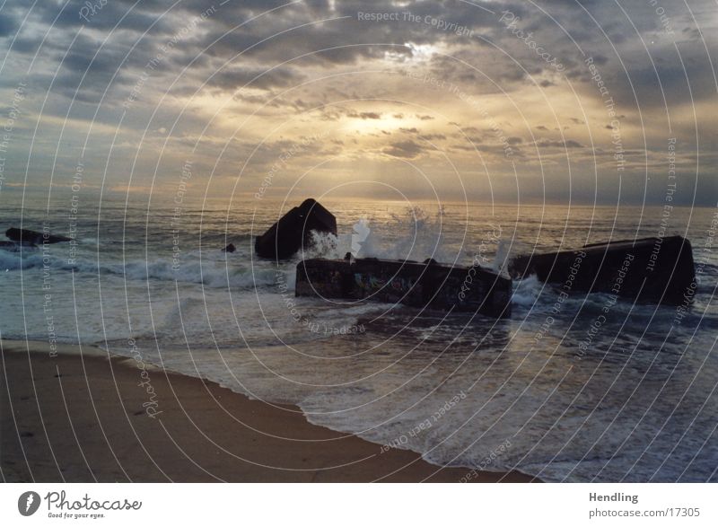 The bunkers sink into the sea Second World War Sunset Ocean Waves Hossegor Europe Dugout capreton France.