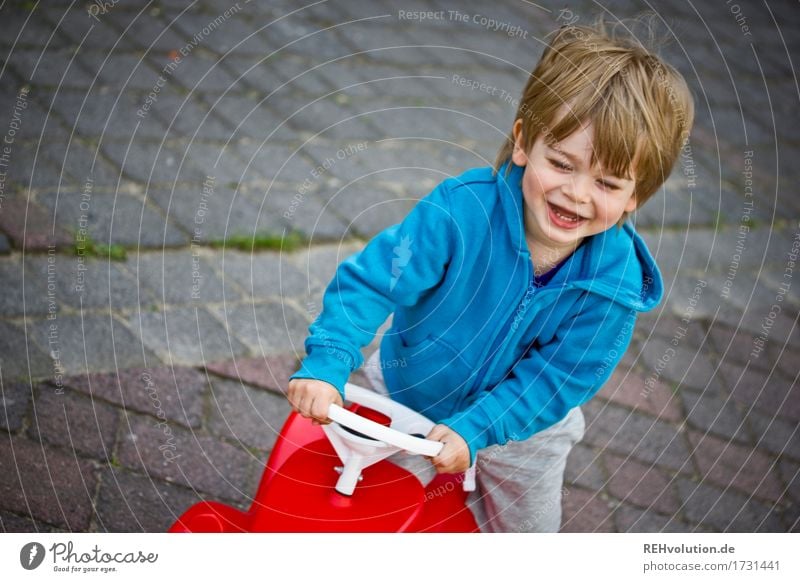 driving pleasure Human being Masculine Child Toddler Boy (child) 1 1 - 3 years Bobbycar Movement Smiling Laughter Playing Happiness Happy Small Funny Cute Blue