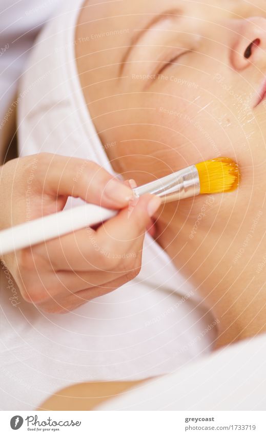 Close-up shot of a woman being applied a facial mask by cosmetician at beauty spa Skin Face Health care Medical treatment Spa Human being Young woman