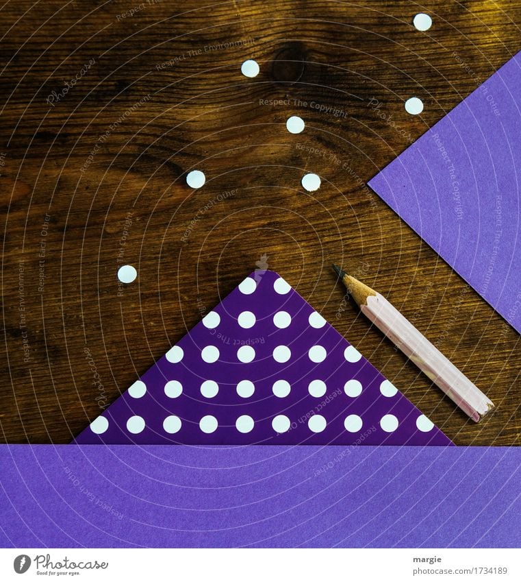 Collect points in a square: purple paper with white dots, pencil on a wooden desk Education Study Examinations and Tests Work and employment Profession