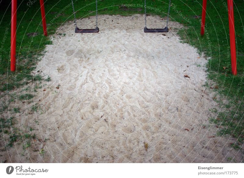 playground romance Leisure and hobbies Children's game Summer Deserted Sand Metal Red Playground Swing Usable Colour photo Exterior shot Copy Space bottom