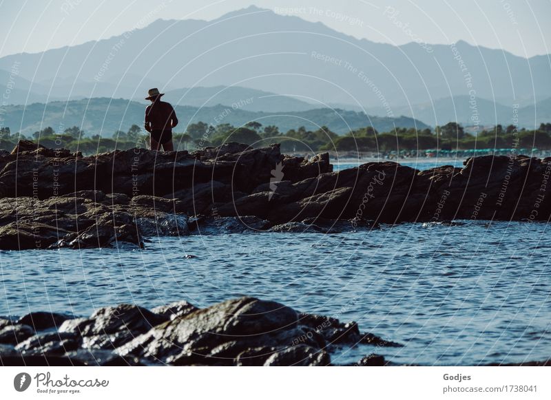 lonesome angler Nature Water Sky Horizon Summer Hill Mountain Coast Sardinia Italy Relaxation Blue Brown Gray Green Patient Calm Serene Colour photo