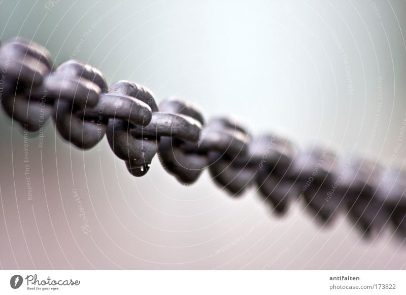 Typical German Drops of water Barrier Metal Steel Chain link Perspective Safety Colour photo Exterior shot Neutral Background Day Sunlight Blur Iron chain