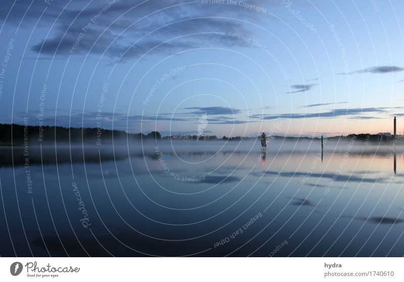 Blue hour in a calm bay with blue sky and a few clouds reflecting in the sea in Sweden after the rain Summer vacation Ocean Island Sailing trip Air Water Sky