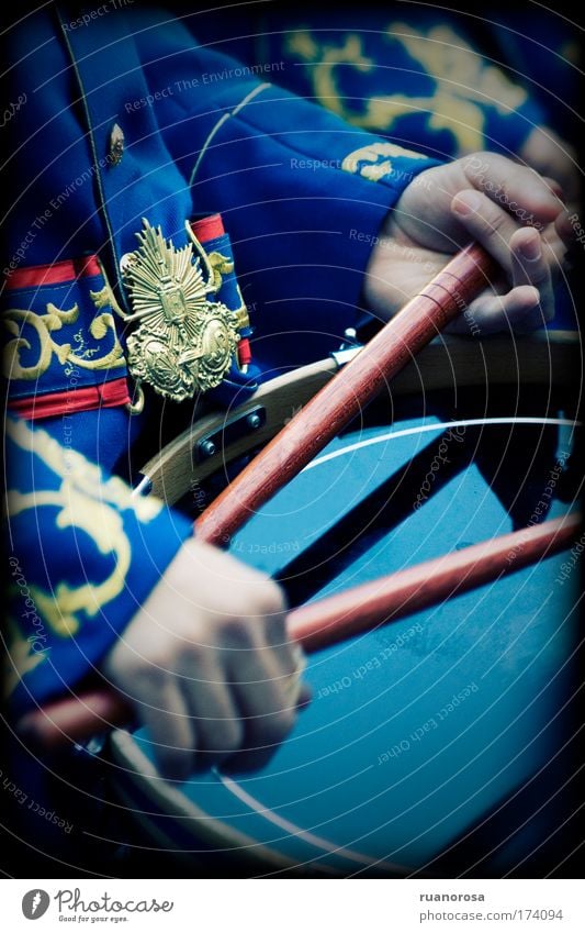 Colour photo Exterior shot Close-up Detail Human being Child Boy (child) Arm Hand 1 Touch Movement Playing Hockey stick Uniform Drum set Children`s hand Band