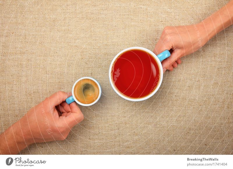 Two hands holding full cups of espresso coffee and black tea To have a coffee Beverage Hot drink Coffee Espresso Tea Mug Woman Adults Man Hand To hold on