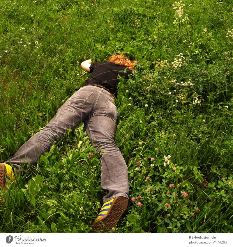 There he lay exhausted. Colour photo Exterior shot Full-length Joy Happy Well-being Contentment Relaxation Masculine Young man Youth (Young adults) 1