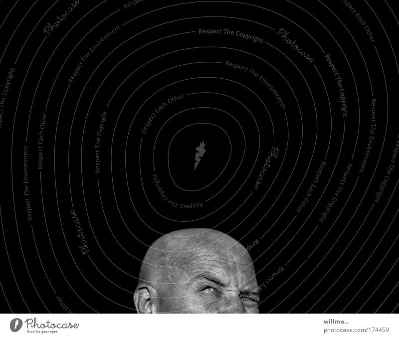 critical thinking with a lot of text free space Man skepticism Doubt Concern Bald or shaved head portrait Fear Fear of the future Stress Disbelief Jealousy