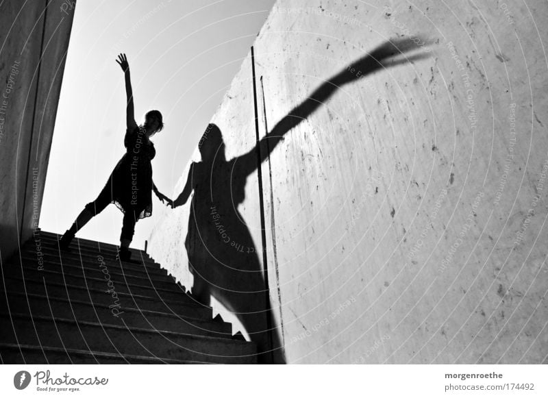 The hiker and his shadow II Black & white photo Exterior shot Sunlight Human being Feminine Young woman Youth (Young adults) Woman Adults Arm Hand 1