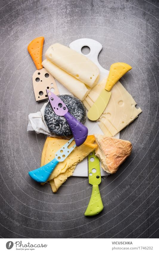 cheese platter Food Cheese Dairy Products Nutrition Knives Style Design Yellow Chopping board Food photograph Eating Cheese knife Selection Cheese slice