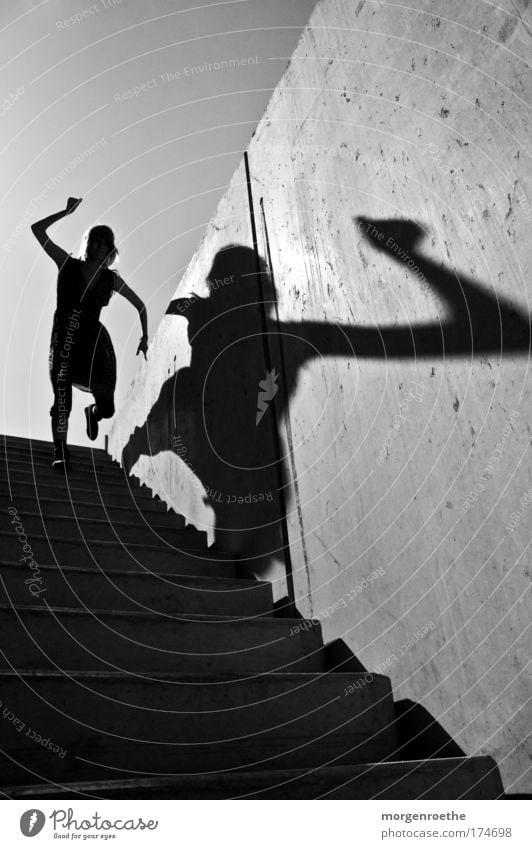 The hiker and his shadow IV Black & white photo Exterior shot Abstract Neutral Background Day Sunlight Human being Young woman Youth (Young adults) 1