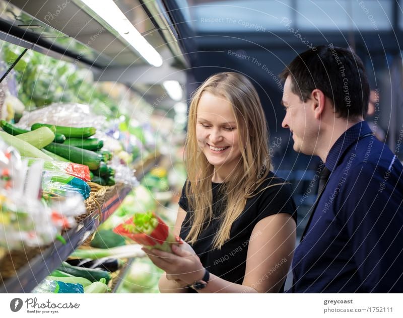 Man and woman shopping for vegetables at the grocery Vegetable Shopping Happy Human being Woman Adults Family & Relations Friendship Couple 2 Smiling Celery