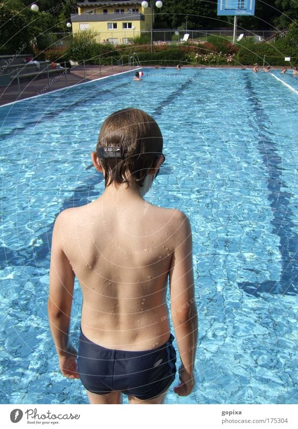 BEFORE THE JUMP Colour photo Exterior shot Reflection Sunlight Upper body Forward Boy (child) 1 Human being 8 - 13 years Child Infancy Water Drops of water