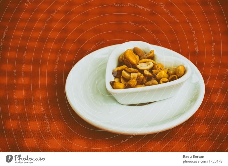 Heart Shaped Bowl With Dried Hard Fruits And Peanuts Food Nutrition Eating Vegetarian diet Diet Plate Table To feed Feeding Love Simple Delicious Brown Orange