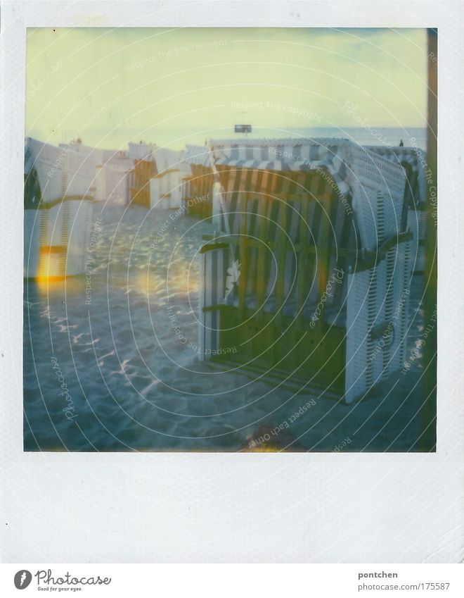 Beach chairs on the beach. The sea in the background. Holiday Polaroid Twilight Light Shadow Light (Natural Phenomenon) Sunlight Leisure and hobbies