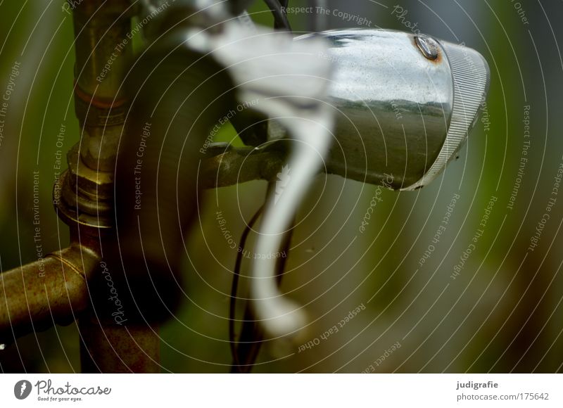 Light on the wheel Colour photo Exterior shot Detail Day Old Glittering Bicycle Lamp Chrome Brakes Rust