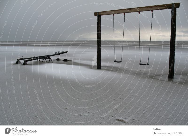 Wintermute Beach Subdued colour Exterior shot Morning Dawn Contrast Long shot Sky Snow Coast North Sea Wood Freeze Sadness Dark Simple Cold Gray Black Moody