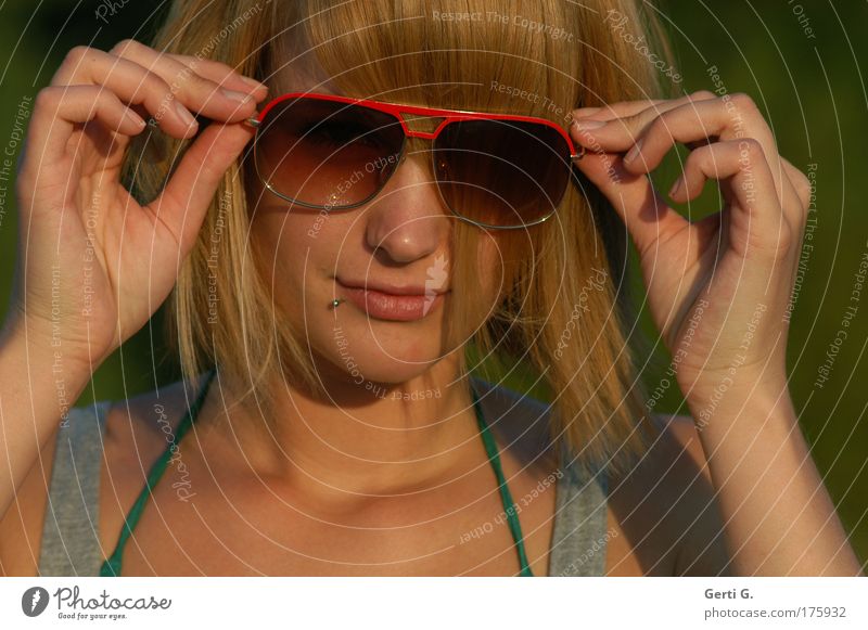 disarm you ... Sunglasses Summery Warmth Eyeglasses Woman Young woman Beautiful Natural Red-haired Hair and hairstyles Hand put on glasses Piercing youthful