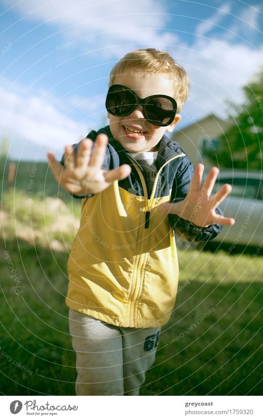 Happy little boy having fun in big sunglasses outdoor Joy Summer Child Boy (child) Infancy 1 Human being 3 - 8 years Nature Landscape Sunglasses Blonde Smiling