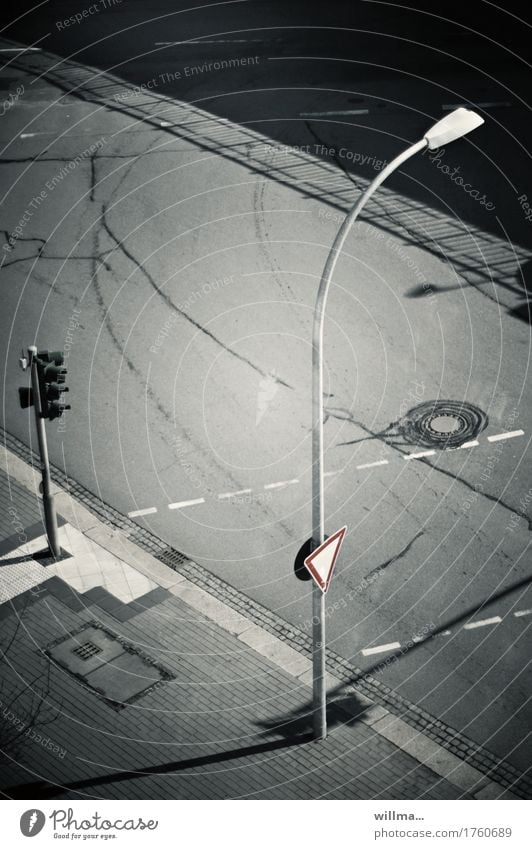 Empty street with lantern and traffic sign and traffic lights Street Traffic light Road sign Lantern Street lighting Traffic infrastructure Road traffic