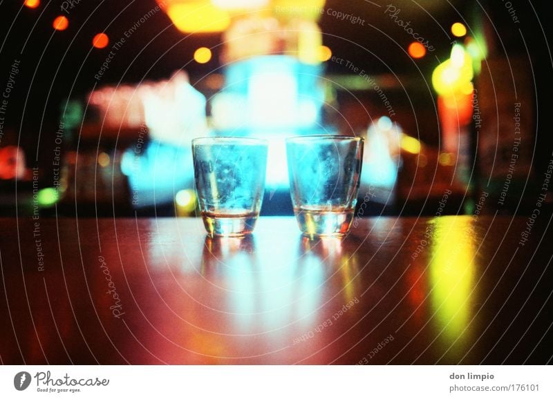 happy hours Multicoloured Detail Artificial light Reflection Back-light Low-key Blur Shallow depth of field Worm's-eye view Beverage Tequila Glass Bar