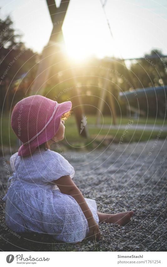 On his own Feminine Child Toddler Girl Body 1 Human being 1 - 3 years Dress Hat Relaxation To enjoy Listening Dream Authentic Happy Positive Contentment