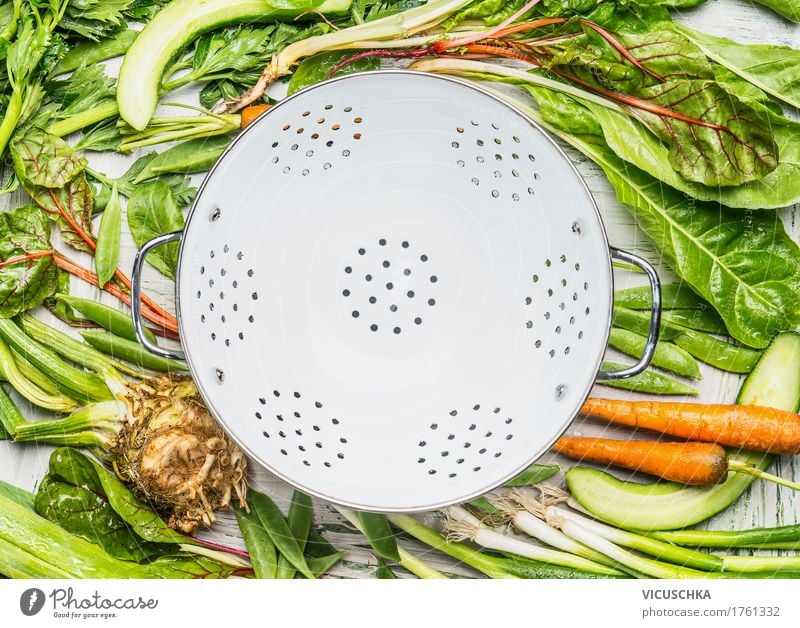 Green organic vegetables around empty kitchen sieve Food Vegetable Nutrition Organic produce Vegetarian diet Diet Crockery Style Design Healthy Healthy Eating