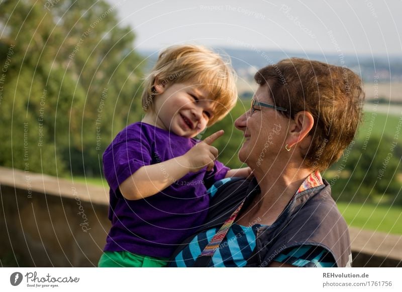 Grandma has her grandson on her arm Human being Masculine Feminine Woman Adults Female senior Grandmother Infancy 2 1 - 3 years Toddler 60 years and older