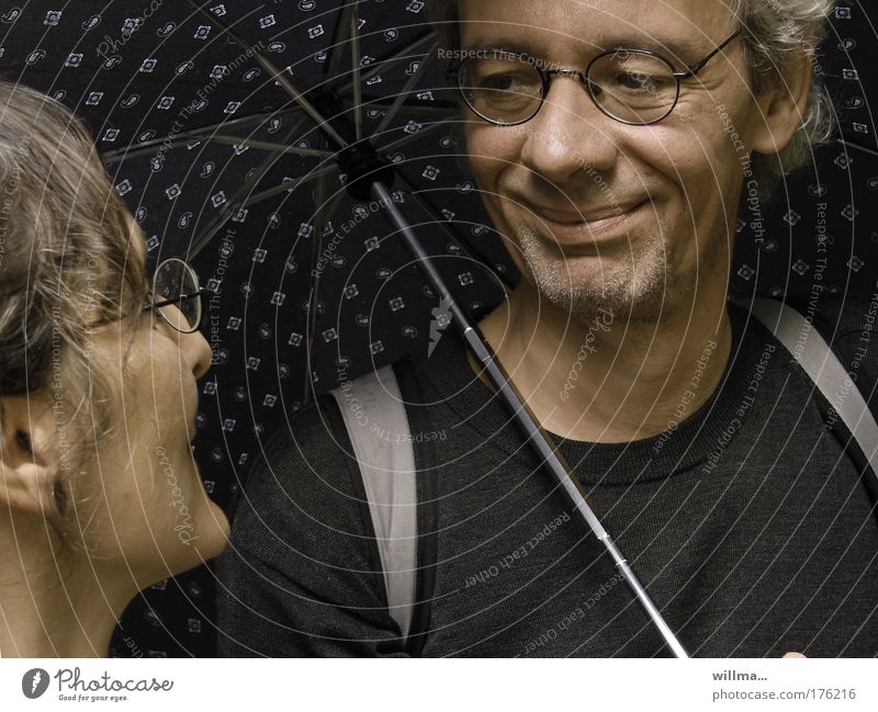 Couple with umbrella he smiles at them in love In love Flirt Woman Man Umbrella Friendship Partner Eyeglasses Emotions Moody Contentment Trust