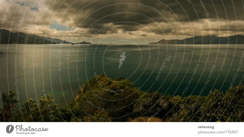 between the worlds Colour photo Exterior shot Deserted Evening Panorama (View) Water Clouds Storm clouds Mountain Bay Ocean Large