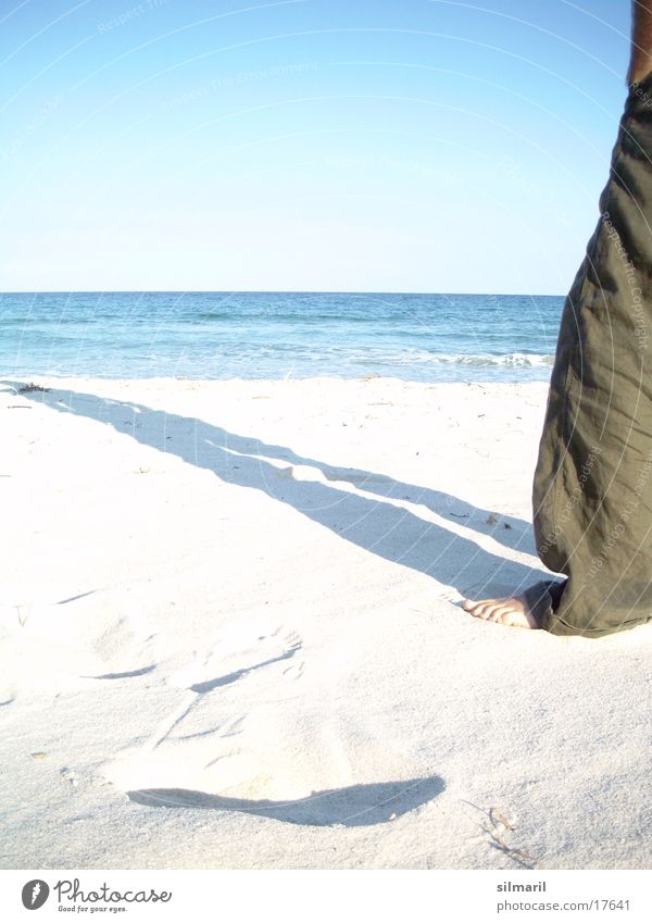 Lonesome on the beach II Beach Ocean Man Leisure and hobbies Vacation & Travel Relaxation Cure Health resort Horizon Stand Pants Stay Calm Far-off places Think