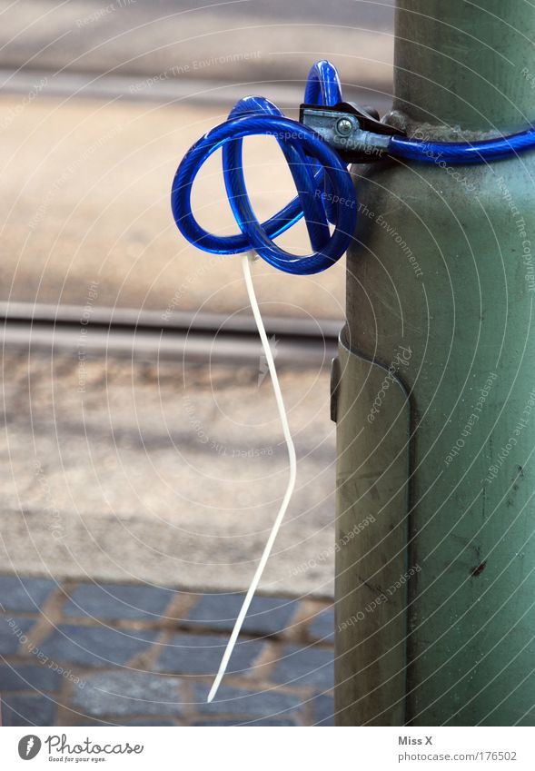 pretzel Lock Burglar-proof Theft Purloin Exterior shot Close-up Detail Deserted Copy Space left Copy Space bottom Day bicycle lock Blue Lack Closed