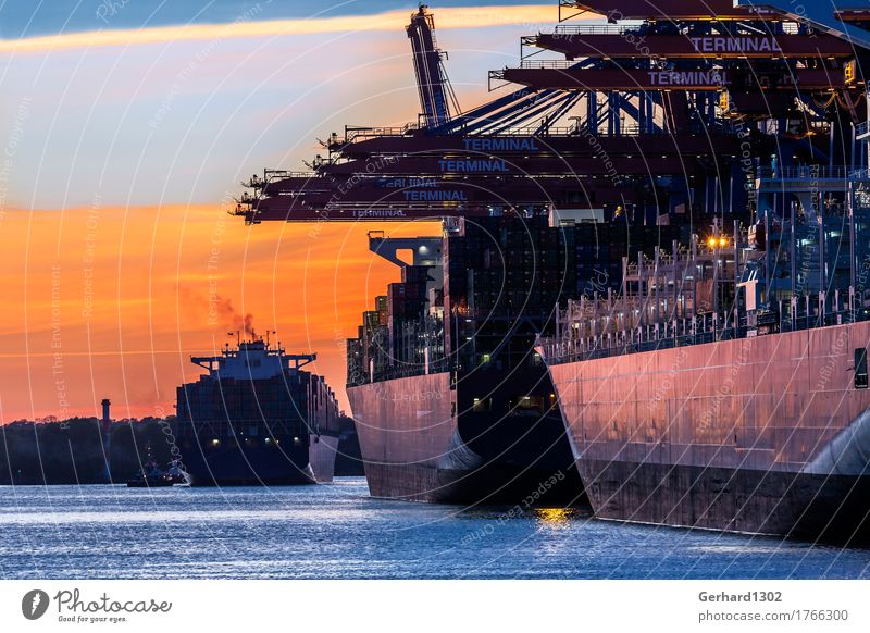 Container ships in the port of Hamburg at night Industry Water Sunrise Sunset Port City Harbour Transport Means of transport Navigation Work and employment