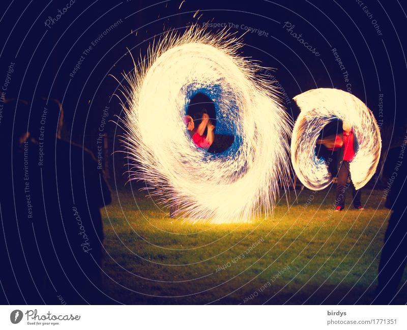 fire magic Joy Night life Party Event Human being Masculine Feminine 2 Group Artist Shows Fire show Summer Garden Meadow Movement Glittering Illuminate Playing