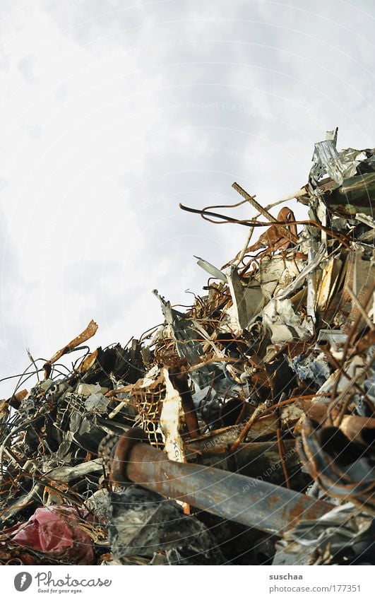 mountains of scrap I Colour photo Subdued colour Detail Metal Steel Rust Threat Dirty Fear of the future Environment Environmental pollution Destruction