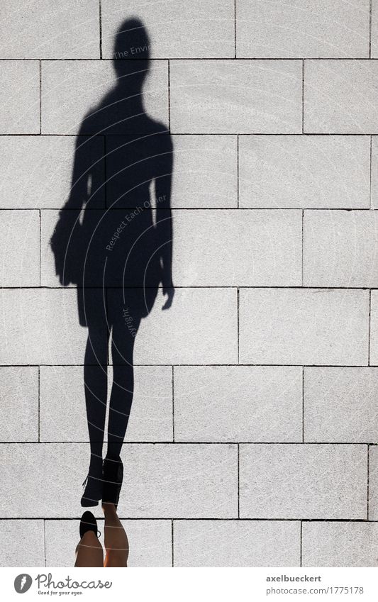 shadow of a woman walking on pedestrian street Lifestyle Elegant Human being Feminine Woman Adults Feet 1 Pedestrian Street Walking Long Above Sidewalk Footpath