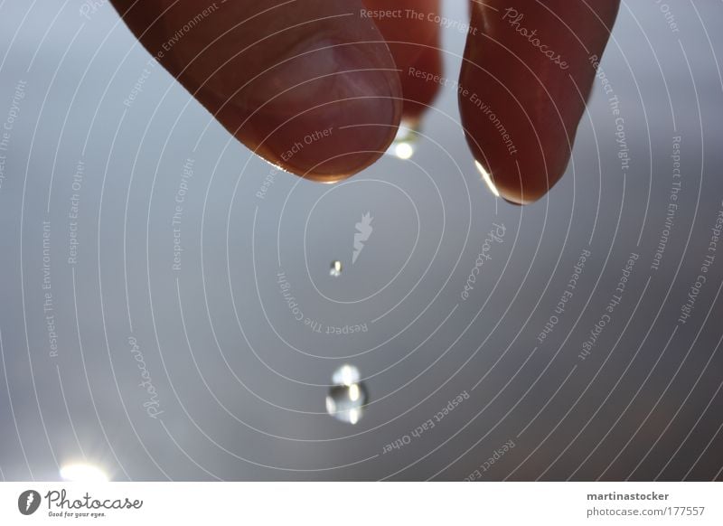 water pearls Colour photo Exterior shot Detail Day Skin Well-being Contentment Freedom Summer Sun Closing time Fingers 1 Human being Water Drops of water